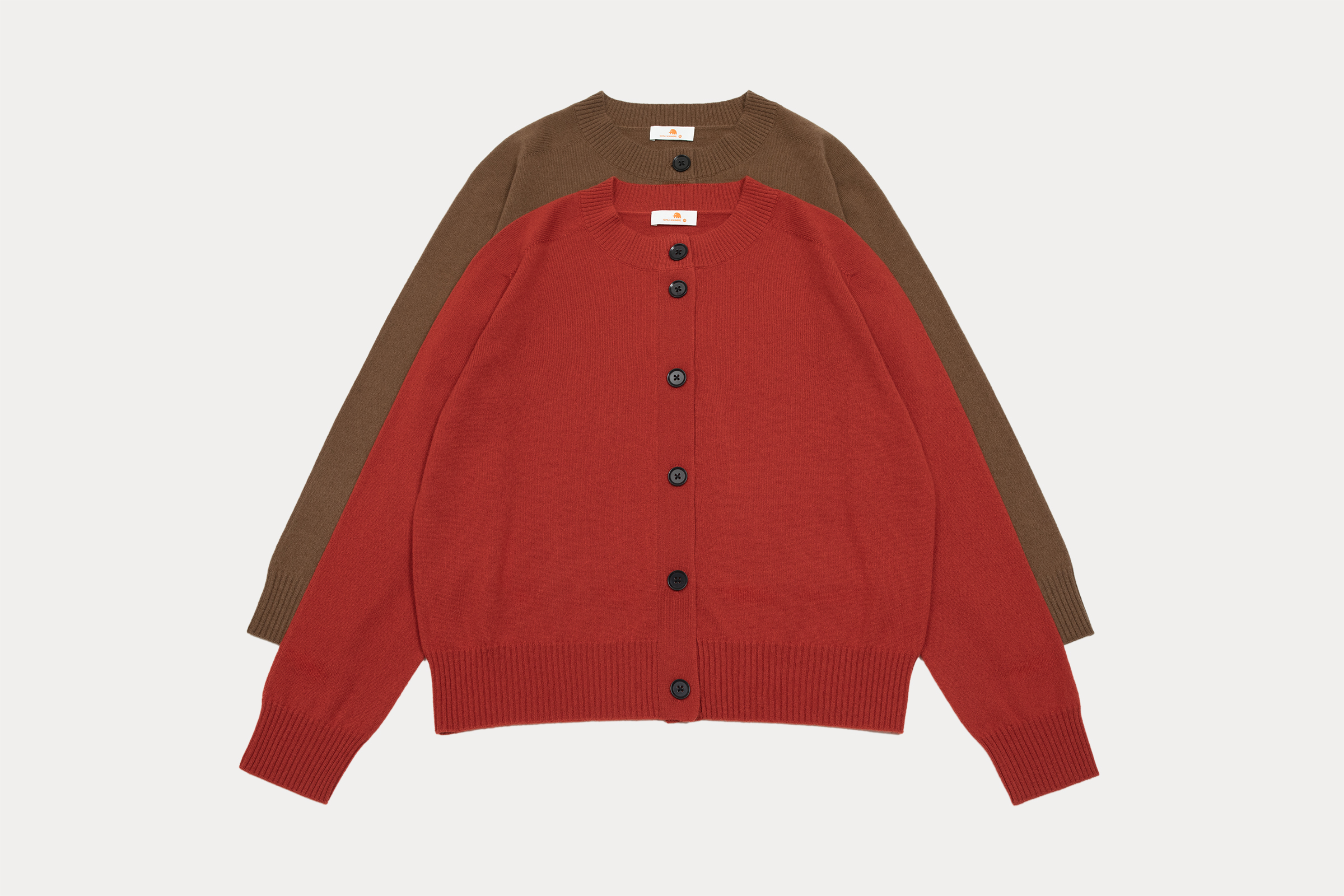 小金象山羊绒100%女无缝一体成型薄款圆领马鞍肩宽松长袖纽扣开衫