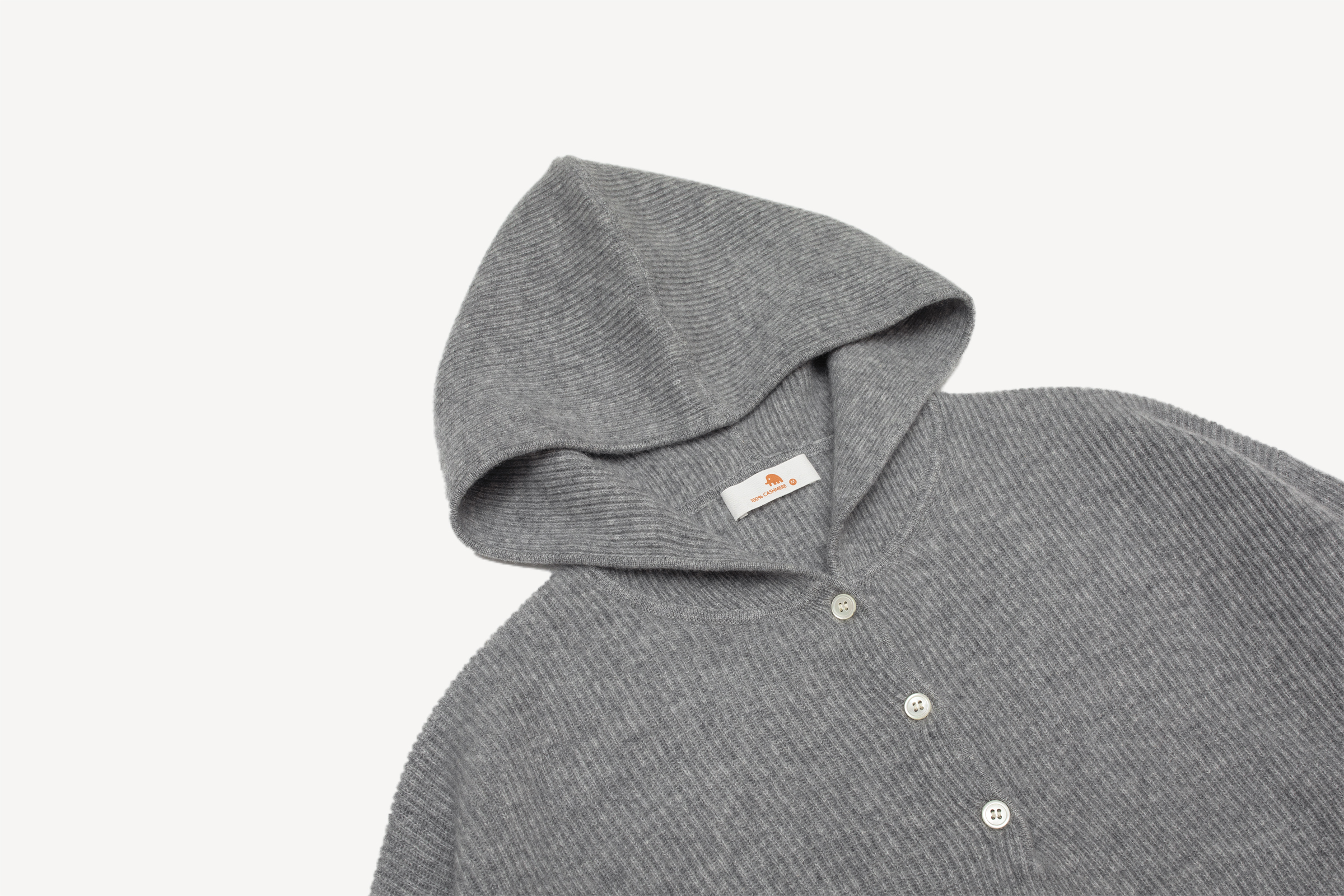 小金象 山羊绒100% 柔和素雅 女中厚纽扣半开宽松落肩袖套头帽衫