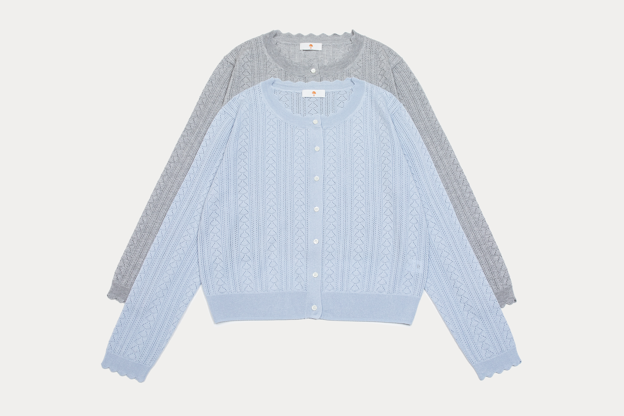 小金象 真丝85%山羊绒15% 女春夏轻薄镂空圆领长袖度假空调开衫