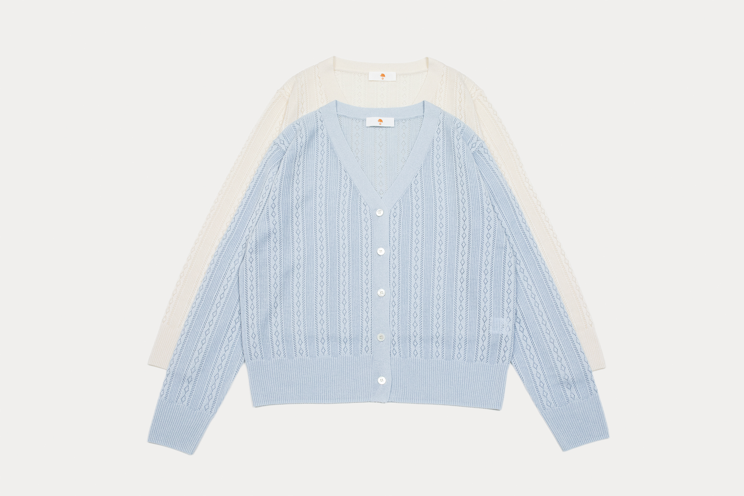 小金象 真丝85%山羊绒15%女春夏轻薄针织镂空花纹V领长袖空调开衫