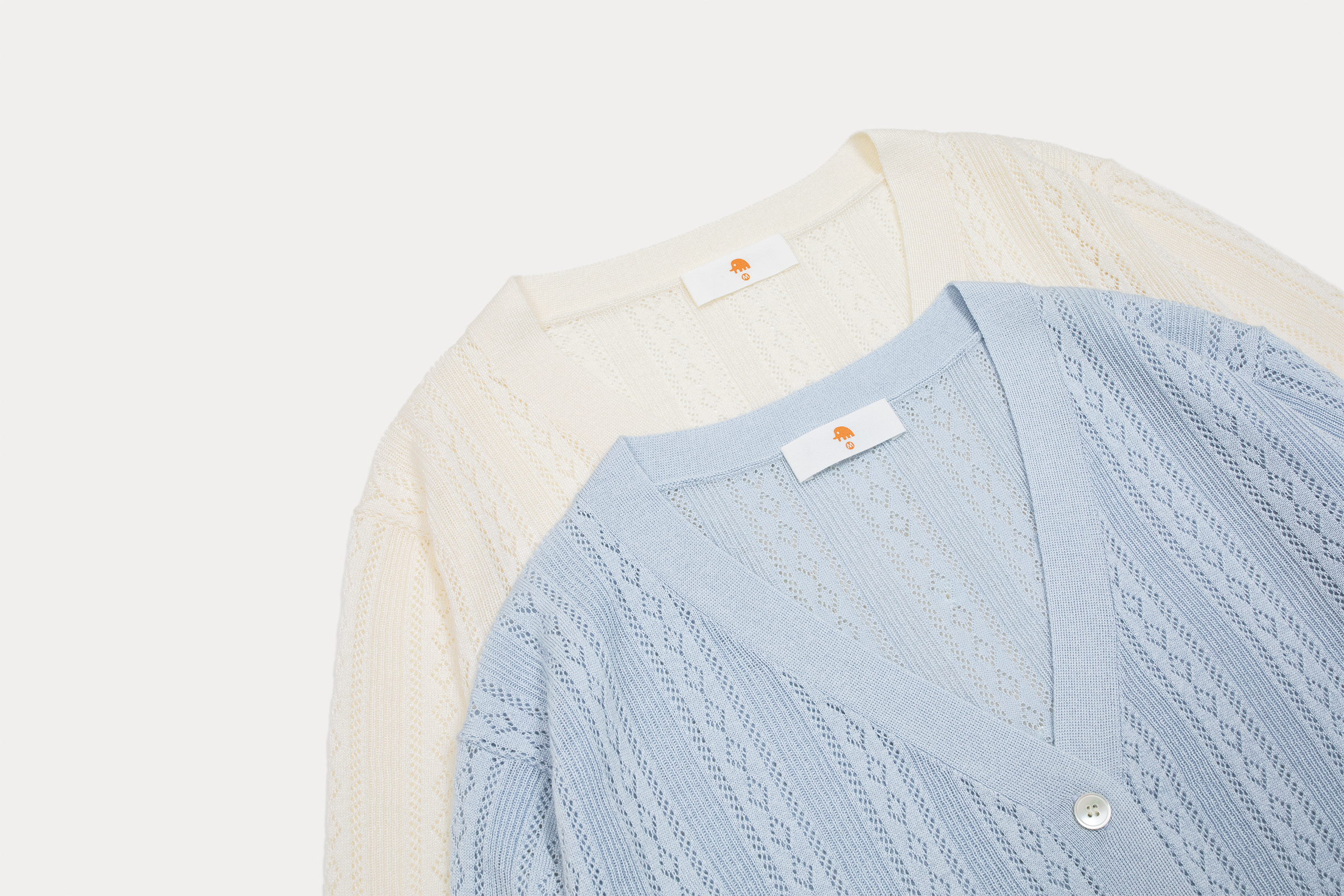 小金象 真丝85%山羊绒15%女春夏轻薄针织镂空花纹V领长袖空调开衫