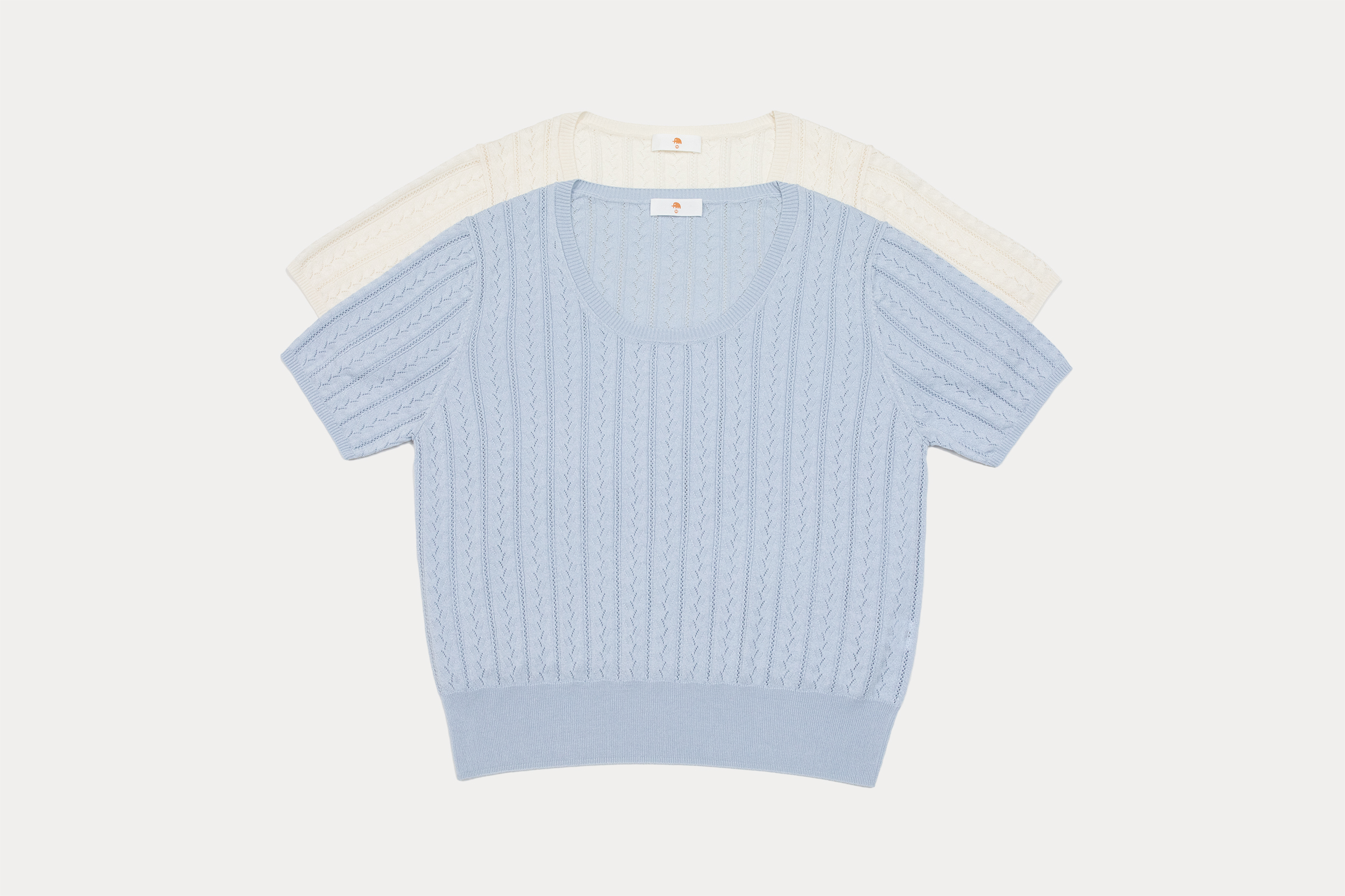 小金象真丝85%山羊绒15%女春夏针织镂空花纹大圆领宽松短袖套头衫