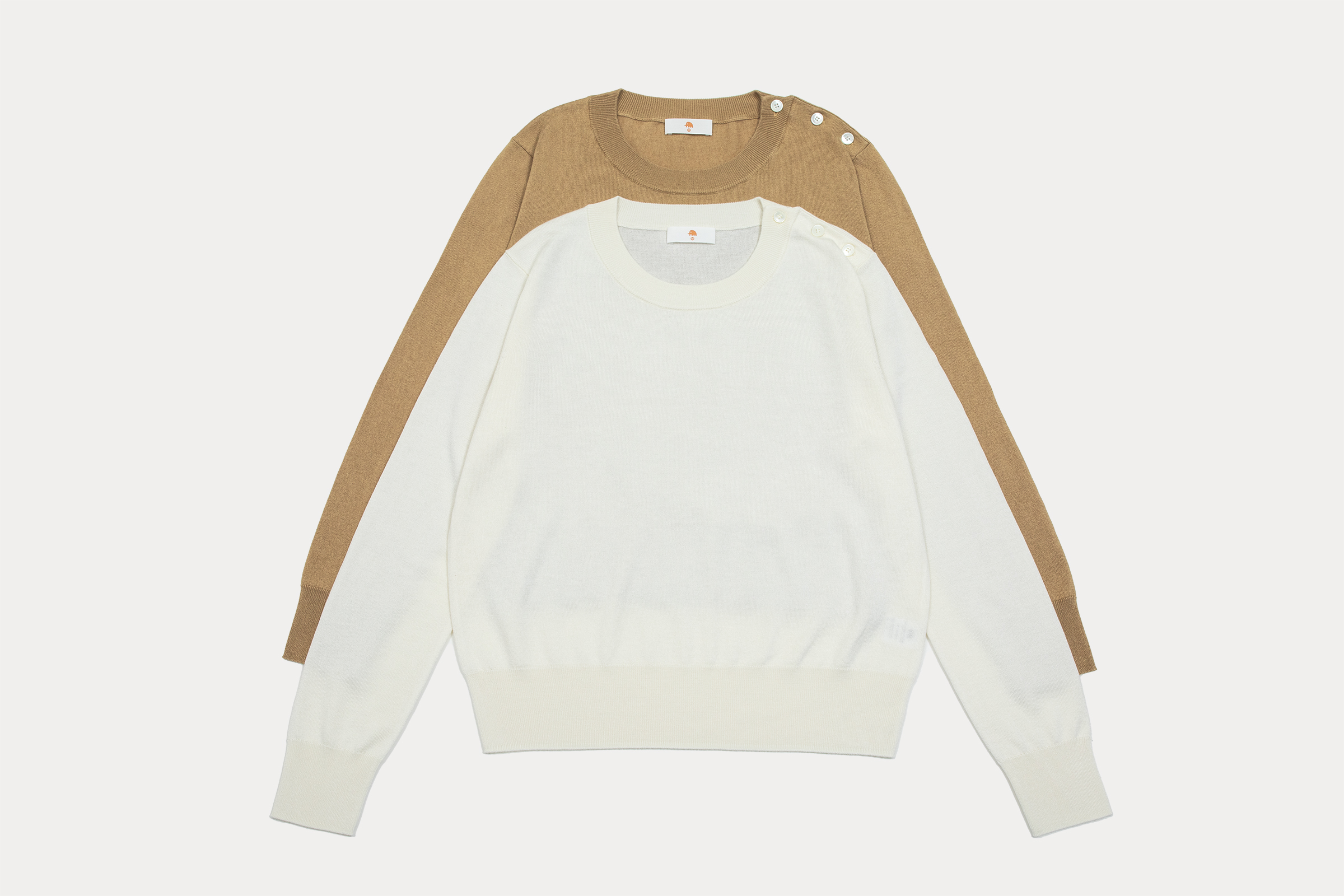 小金象真丝85%山羊绒15% 女春夏基础通勤肩部纽扣圆领长袖套头衫