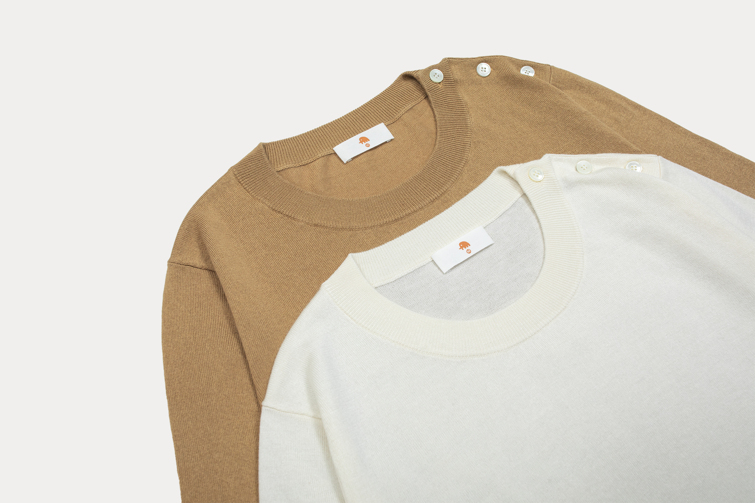 小金象真丝85%山羊绒15% 女春夏基础通勤肩部纽扣圆领长袖套头衫