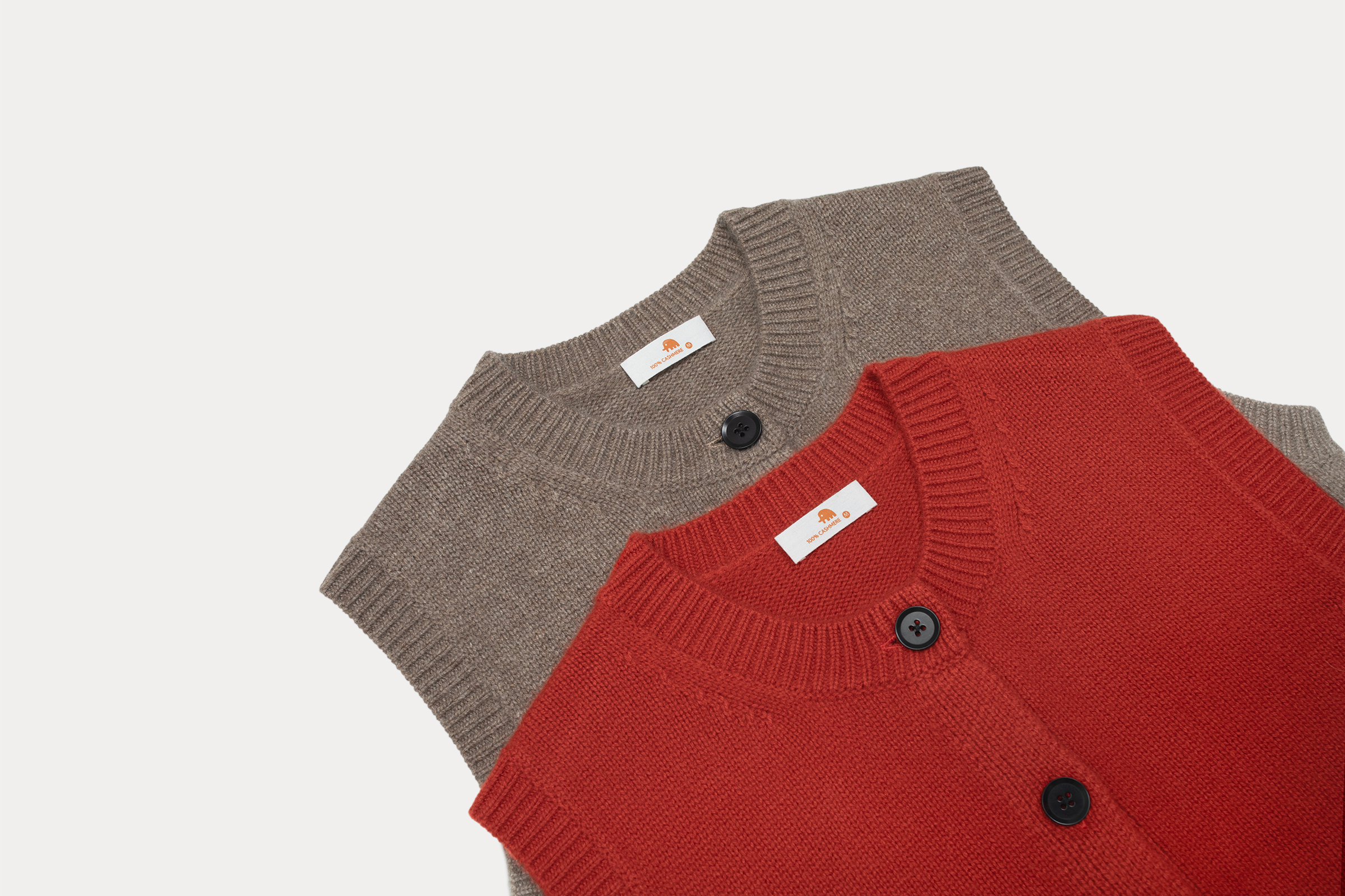 小金象 山羊绒100% 女5针4根纱加厚短款保暖圆领纽扣无袖背心开衫