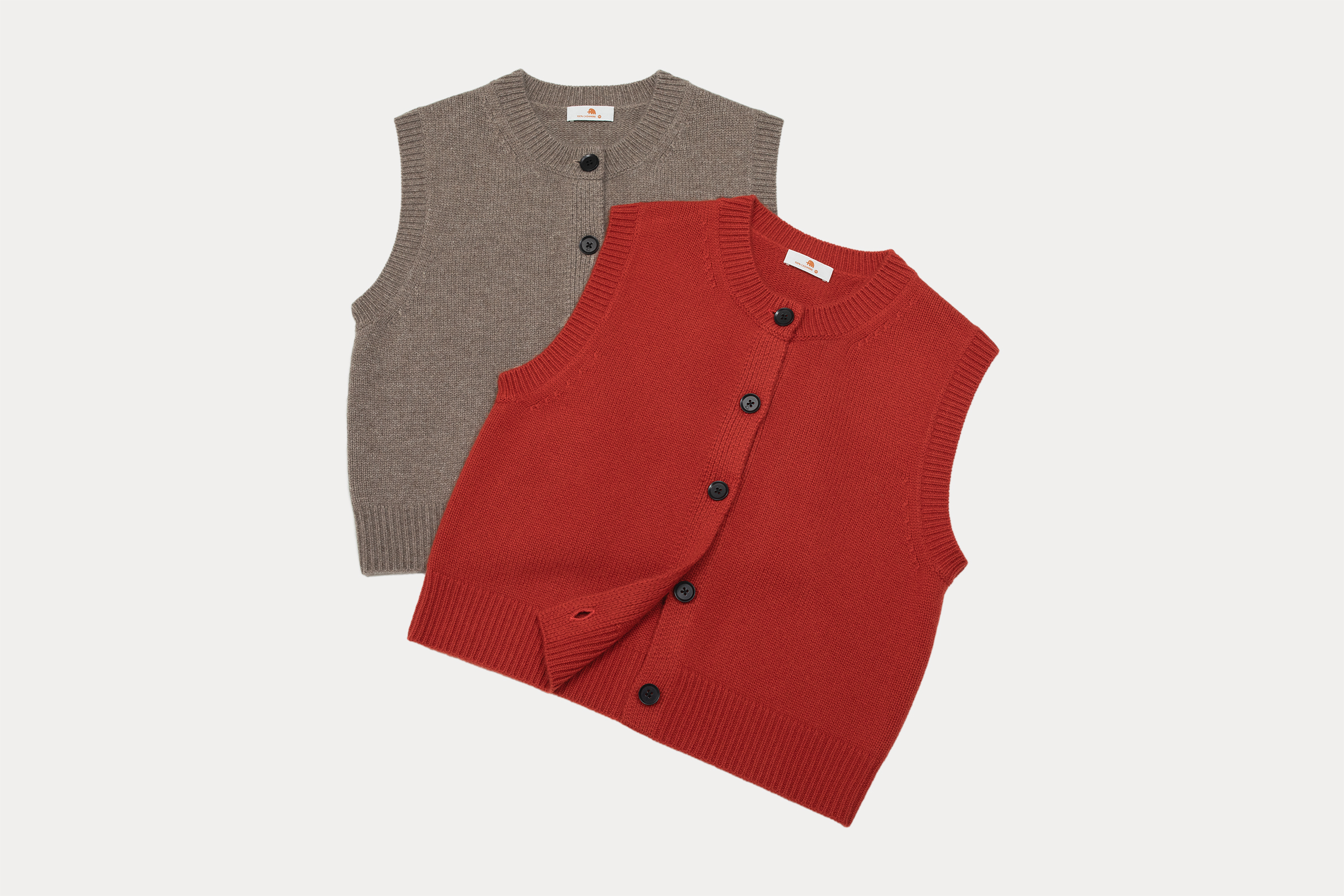 小金象 山羊绒100% 女5针4根纱加厚短款保暖圆领纽扣无袖背心开衫